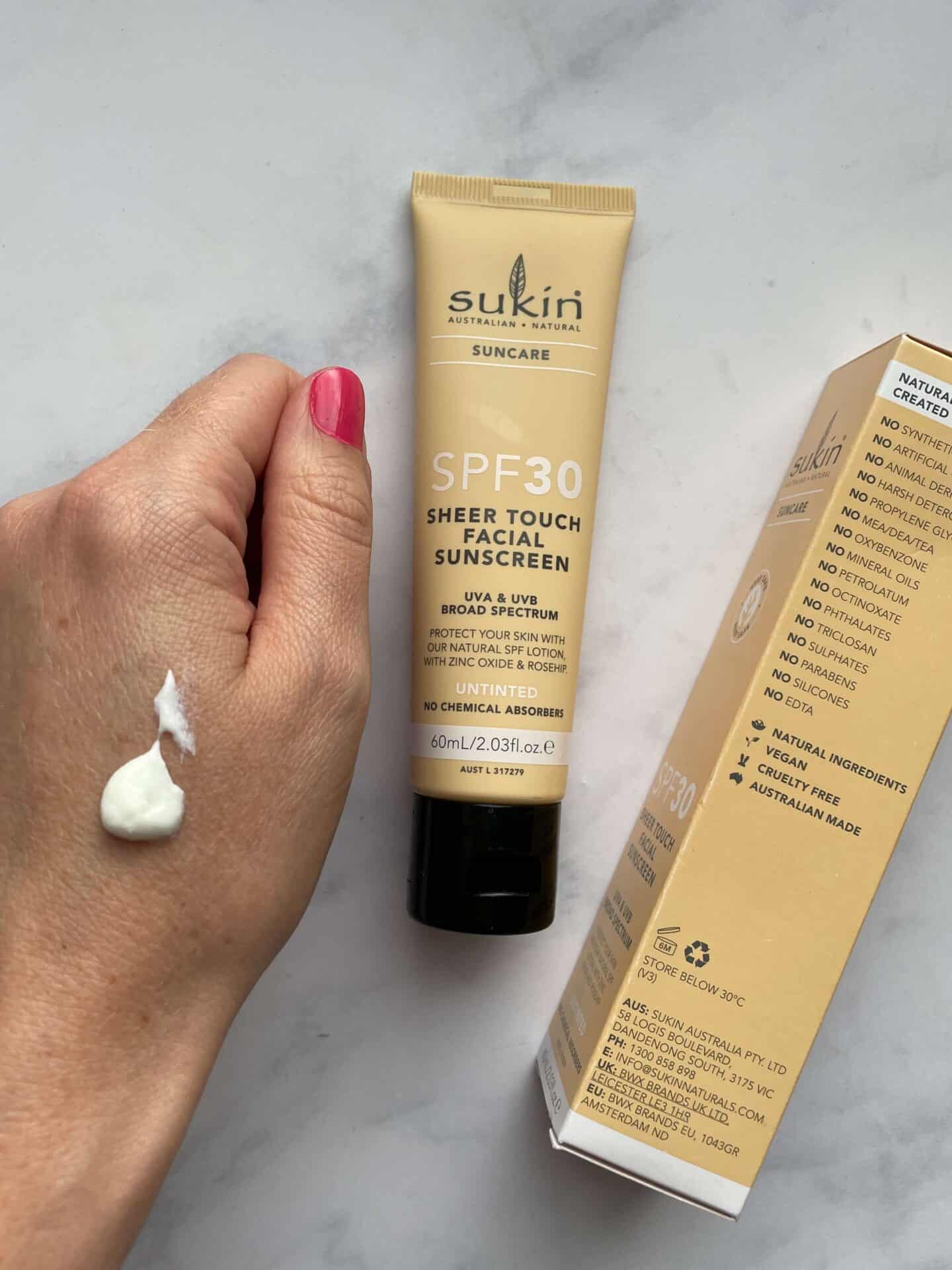 Sukin SPF30 Sheer Touch Tinted Sunscreen in Untinted swatch on hand 1440x1920 1